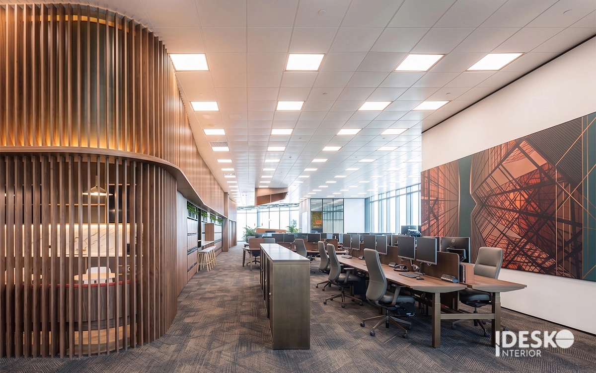 Thiết kế văn phòng mở loại bỏ các vách ngăn truyền thống giúp tối ưu diện tích và tăng cường khả năng tương tác giữa các bộ phận